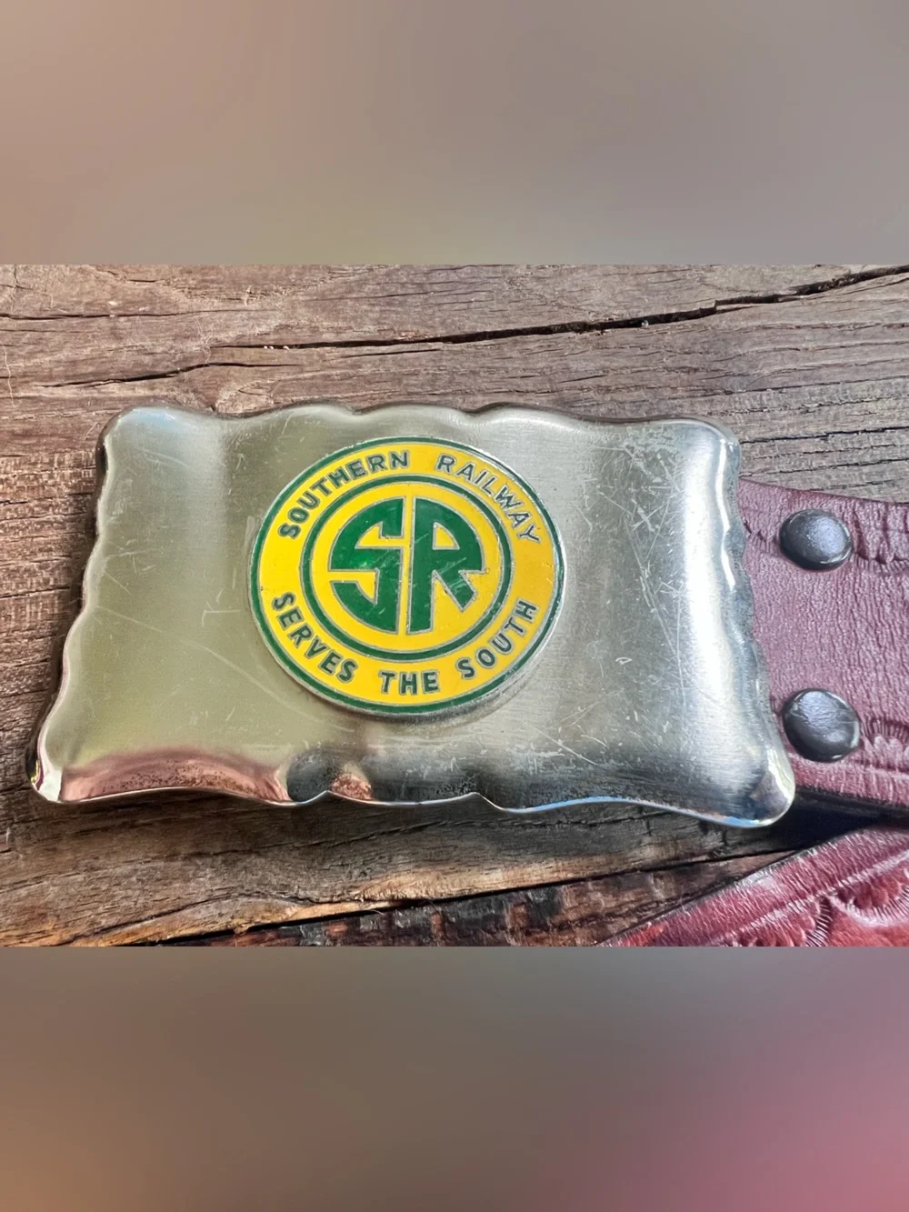 Men’s leather belt with “Southern Railway Serves the South” belt buckle.